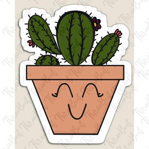 May include: A sticker of a potted cactus with a smiling face. The cactus is green with brown spines and pink flowers. The pot is brown with a white outline.