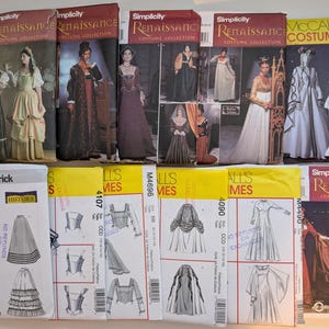 May include: A collection of twelve sewing patterns for historical costumes, including Simplicity Renaissance, McCall's, and Butterick brands. The envelopes feature illustrations and photographs of long dresses, skirts, and bodices with various sleeve styles.