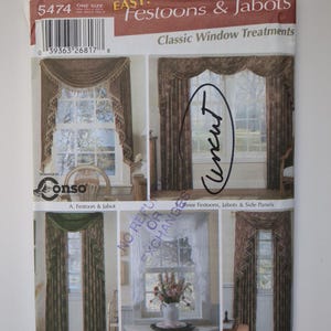 May include: A vintage Simplicity Home Decorating pattern for Festoons & Jabots. The cover showcases different window treatment designs, including festoons, jabots, and side panels. The pattern number is 5474.