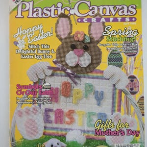 May include: A magazine cover for "Plastic Canvas Crafts" with an Easter theme. The cover shows a stitched bunny holding a sign that says "Happy Easter!" and "Gifts for Mother's Day". Includes craft ideas.