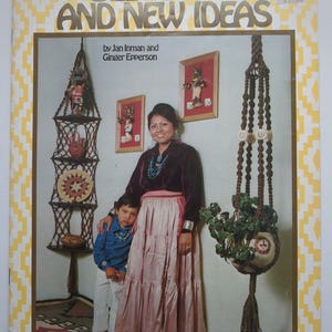 May include: A softcover book titled Old Knots and New Ideas by Jan Inman and Ginger Epperson. The cover features a photograph of a person and a child standing in a room decorated with macrame wall hangings, a hanging plant, and framed art.