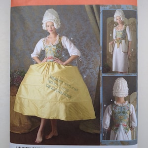 Puede incluir: Patrón de costura Simplicity 3635, talla KK 8, 10, 12, 14, que presenta un disfraz de estilo histórico con una blusa blanca, un corpiño tipo corsé con estampado floral y una falda amarilla voluminosa. El paquete incluye ilustraciones.