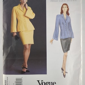 May include: A sewing pattern envelope for a Lagerfeld Vogue Paris Original suit, featuring a yellow jacket and skirt set. The cover displays a photograph of the outfit and a matching illustration, with the text 1432 and Vogue Patterns visible.