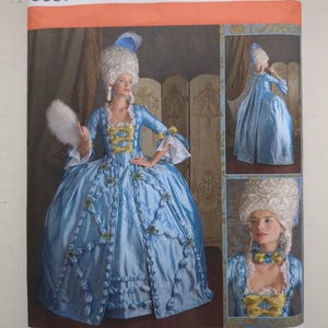 May include: Simplicity pattern 3637 for a light blue gown with a full skirt, ruffled trim, and yellow bows. The package features a person wearing the gown, a white powdered wig, and holding a white fan, with size range KK 8, 10, 12, 14.
