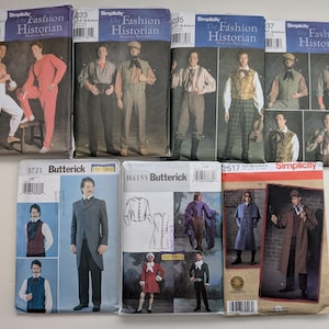 May include: A collection of seven sewing pattern envelopes from Simplicity and Butterick, featuring historical clothing designs for shirts, vests, trousers, and coats. Each envelope displays illustrations of finished garments, model numbers, and brand logos.