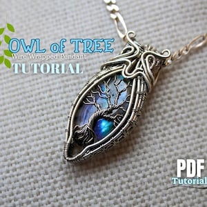 May include: A silver wire-wrapped pendant with a tree design and a blue and green stone center. The pendant is on a silver chain. Text on the image reads "OWL of TREE Wire Wrapped Pendant TUTORIAL" and "PDF Tutorial".