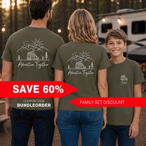 May include: Olive green t-shirts with a white graphic of a camper, mountains, and the text "Adventure Together." The shirts are worn by a family. The child's shirt has a smaller camper graphic and the name "Lukas."