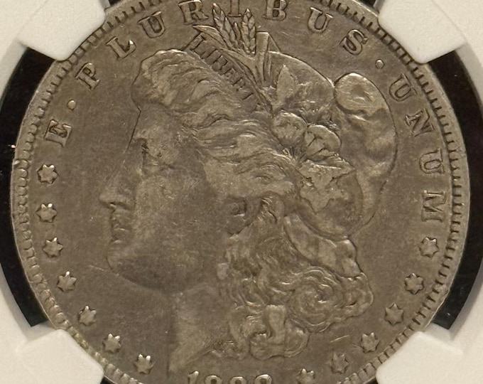 1888 O Morgan Silver Dollar • Top 100 VAM-4 Variety, Double Die Obverse (DDO) Hot Lips • New Orleans Mint • Graded Very Fine NGC VF25
