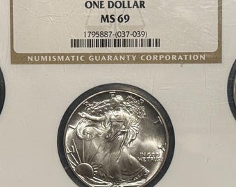 3 Coin Silver Eagle Set (1986, 1987 & 1988) • Slab Holder Encapsulating All Coins • First 3 Years of Philadelphia Mintage • Graded NGC MS69