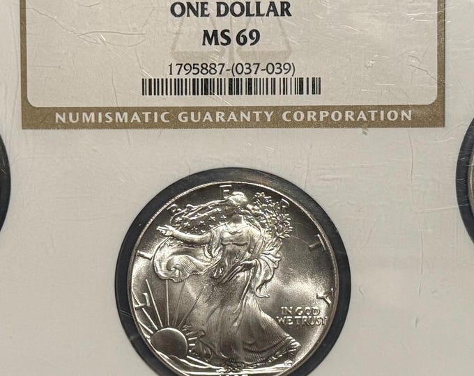3 Coin Silver Eagle Set (1986, 1987 & 1988) • Slab Holder Encapsulating All Coins • First 3 Years of Philadelphia Mintage • Graded NGC MS69