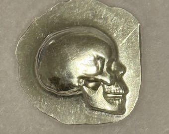PIECES OF HATE, Hand Poured Skull Design in Capsule Display • 1/4 oz Pure Silver (.999 Fine) • Limited Mintage