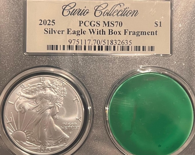 CURIO COLLECTION 2025 Silver Eagle • Original Mint Monster Box Fragment Label + Velvet Gift Bag • Total Population of 100 • Graded PCGS MS70