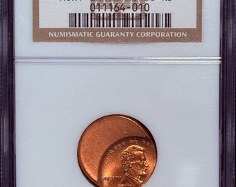 Lincoln Memorial Penny MINT ERROR, Struck Off Center • Graded NGC MS66 Rd (Red)