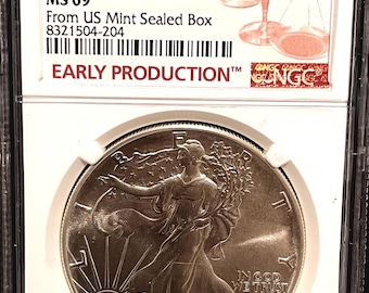 1986 S American Silver Eagle • Struck at San Francisco Mint • From US Mint Sealed Box, Early Production Label • 1 oz Fine Silver • NGC MS69