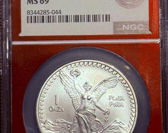 1993 MO Mexico 1 Onza Libertad • 1 oz Fine Silver (99.9% Pure) • EDC Red Core Label • Better Date Better Grade • Graded NGC MS69