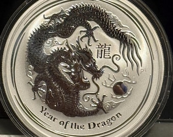 2012 Australia Year of the Dragon Silver Dollar • 1 oz Fine Silver Coin in Capsule (99.9% Pure) • Perth Mint • Rim Toning on Obverse