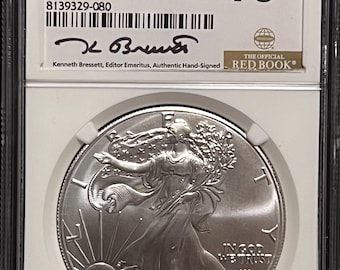 2024 W Burnished American Silver Eagle • West Point Mint • Kenneth Brewster Signed, First Day of Issue Red Book Label • NGCX Mint State 10