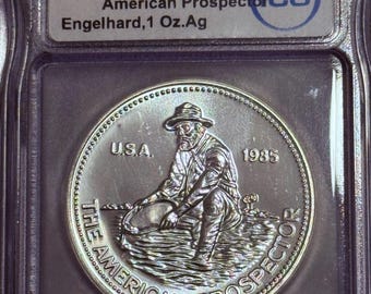 1985 Engelhard American Prospector Vintage Silver Round • 1 oz Fine Silver (99.9% Pure) • Eagle Reverse • Graded ICG MS68