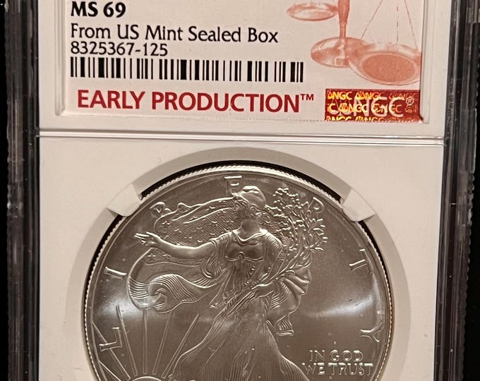 2002 American Silver Eagle Struck in 2001 • From US Mint Sealed Box, Early Production Label • 1 oz Pure Silver (.999 Fine) • Graded NGC MS69