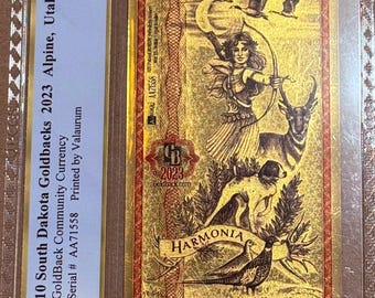 2023 South Dakota Alpha Series, 10 GOLDBACKS • First Year of Issue • 1/100oz Gold Currency Note (.999 Fine, 24K) • Graded PCGS 69 PPQ