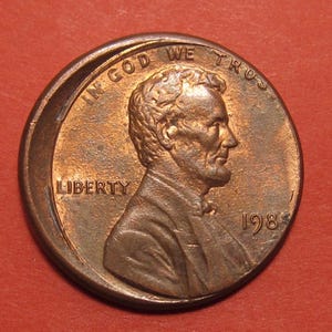 1985 Lincoln Memorial Penny, MINT ERROR • Struck 10% Off-Center • Ungraded Au/MS (About Uncirculated/ Mint State)