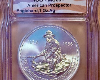 1986 Engelhard American Prospector, Eagle Reverse • 1 oz Pure Silver Round (.999 Fine) • Flag Label, Graded ICG MS69+
