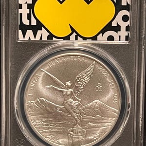 2022 Mexico Libertad 1 Onza Silver Coin • Whatnot Trade Show Label, Limited Mintage • 1 oz Fine Silver (99.9% Pure) • Graded PCGS MS70