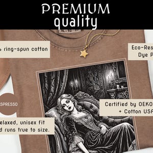 May include: Espresso-colored t-shirt with a black and white illustration of a woman in a gothic setting. The shirt is made of 100% ring-spun cotton and has a relaxed, unisex fit. The shirt is certified by OEKO-TEX&reg; + Cotton USA&trade;.