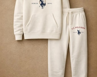 Conjunto de chándal unisex con capucha y pantalón de chándal de polar blanco roto, estilo polo de EE. UU., estampado