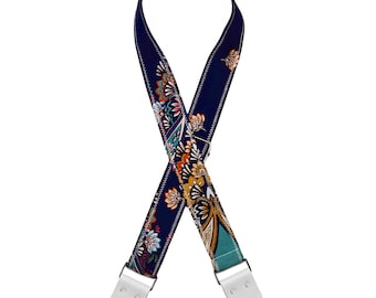 Correa de guitarra ornamental: diseño folk azul marino con extremos de cuero