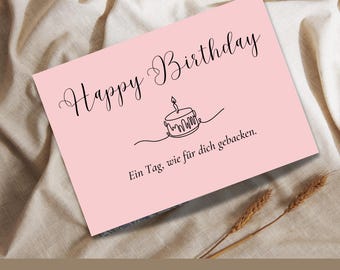 May include: A pink birthday card with the words "Happy Birthday" in elegant script. A line drawing of a cake with a lit candle is below the text. The German phrase "Ein Tag, wie für dich gebacken" is also on the card.