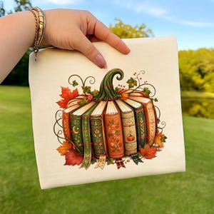 Pumpabokstapel PNG, mysig höstbokdesign, höstläsare, bokälskare-tröja PNG, boklig pumpa, biblioteksestetik, läsarpresent