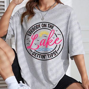 Errbody On The Lake Gettin Tipsy Png file, Lake Life Shirt design, Funny Lake Tee, Summer Vacation, Boat Day, Lake Weekend Tee, Party Lake
Spring 2026 shirt PNG, Mother’s Day coquette bow PNG, floral mama shirt design, teacher appreciation squad PNG, graduation season shirt SVG, summer vacation aesthetic PNG, boho floral sublimation design, cottagecore printable wall art, trendy girly PNG, instant digital download, unique seasonal gift idea, Fourth of July, 4th july, Svg file Png file