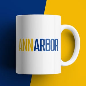 Ann Arbor Coffee Mug Blue and Yellow Bold Block Letters Ceramic Michigan Gift for College Town Lover Wolverine Fan Office Dorm Cup