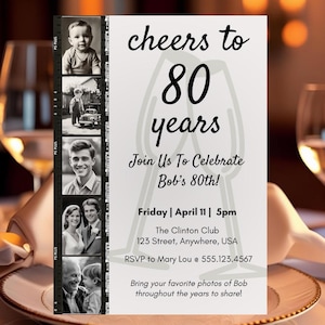 May include: An invitation card with the text "cheers to 80 years" and a series of black and white photos. The invitation includes event details: date, time, location, and RSVP information. The card is set on a table with plates and wine glasses.