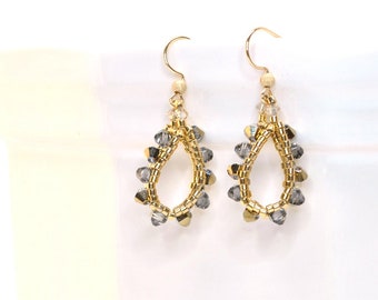 gold and swarovski crystal earrings . small hoop earrings . loop teardrop shaped crystal earrings . modern gold crystal earrings . urban .