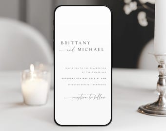 May include: A white wedding invitation on a smartphone screen. The invitation reads "Brittany and Michael invite you to the celebration of their marriage Saturday 8th May 2026 at 4pm Avington Estate - Hampshire reception to follow."