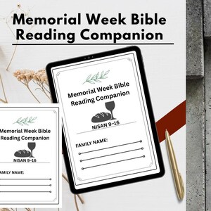 May include: A digital tablet and a printed card display the text "Memorial Week Bible Reading Companion." The design includes a bread and wine glass icon, with the text "NISAN 9-16" and space for a family name. A gold pen rests nearby.