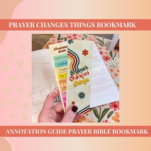 May include: A decorative bookmark with the text "Prayer Changes Things" in a retro font. The bookmark features a colorful design with floral accents and an annotation guide. The text "Annotation Guide Prayer Bible Bookmark" is also present.