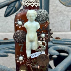 Time In A Bottle Frozen Charlotte Altered Art Vintage Excavated Bottle Assemblage Mixed Media Handcrafted By Alteredhead