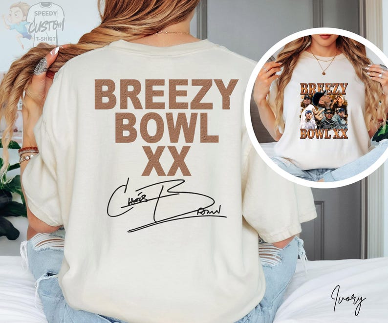 a person wearing a white t-shirt with the text "BREZY BOWL XX" printed on it.