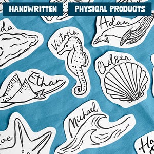 May include: A set of ten personalised stickers featuring various sea creatures and names. The stickers are printed in black ink on white paper and are perfect for adding a touch of whimsy to any project.