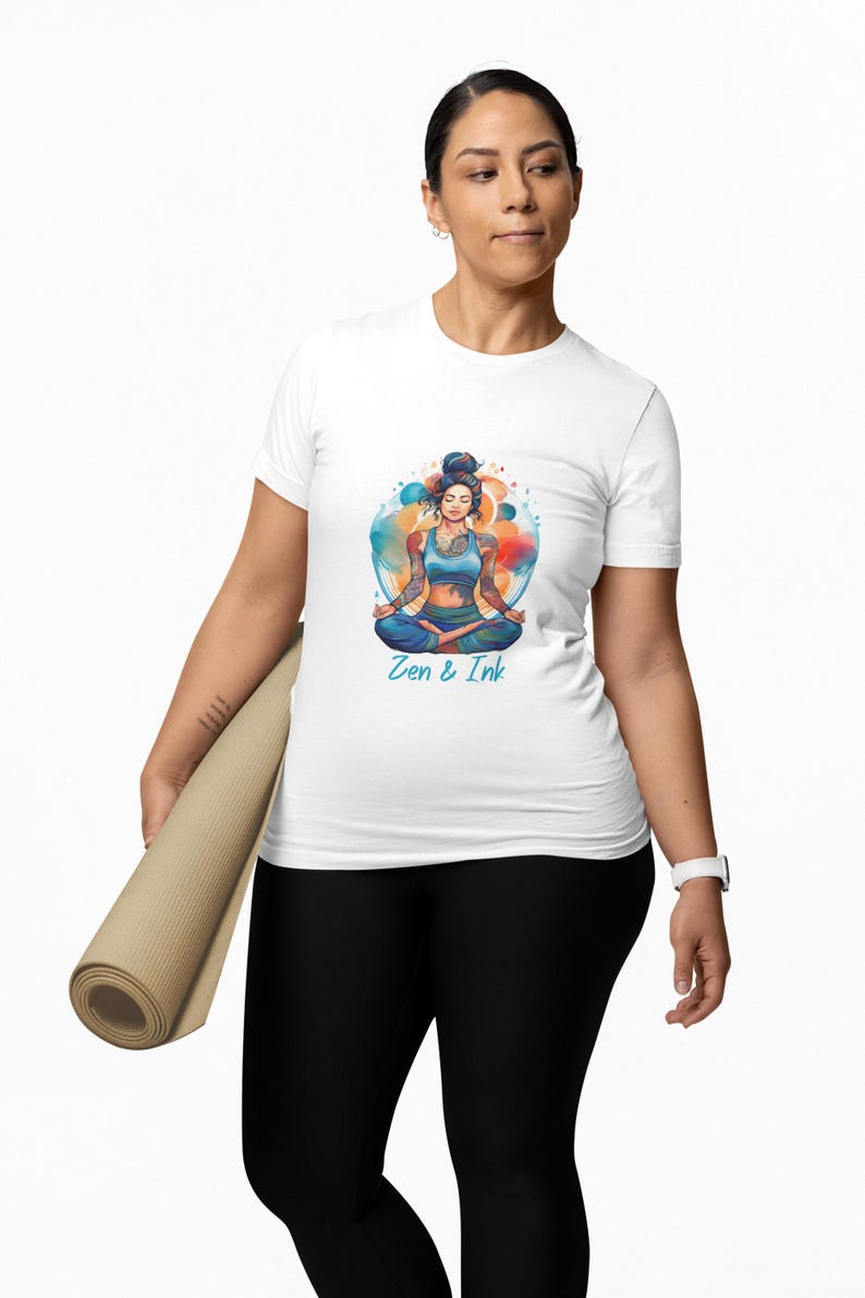 T-shirt with design of woman with tattoos sitting in yoga pose
