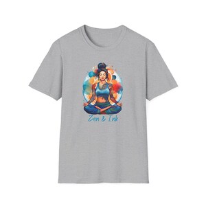 T-shirt with design of woman with tattoos sitting in yoga pose