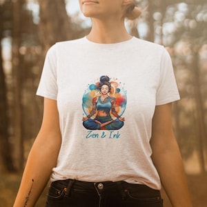 T-shirt with design of woman with tattoos sitting in yoga pose