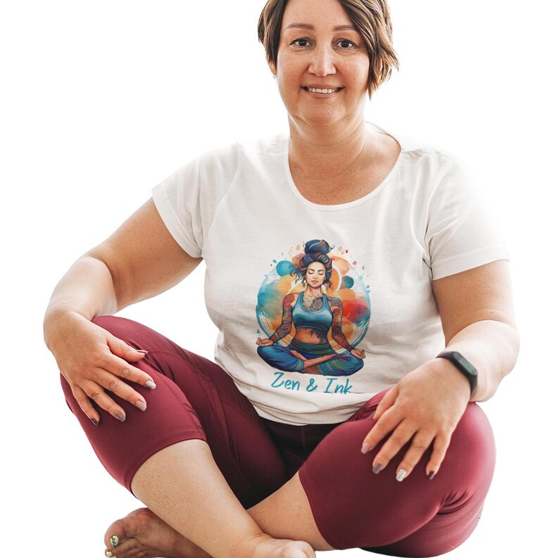 T-shirt with design of woman with tattoos sitting in yoga pose