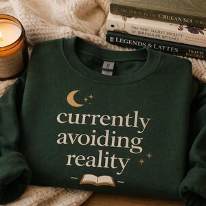 Cozy Book Lover Sweatshirt: Currently Avoiding Reality, Introvert Reading Crewneck