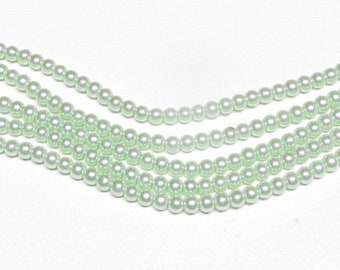 Light green aurora faux pearls beautiful 3-1/2 mm lot of 4800 Light green aurora faux pearls beautiful 3-1/2 mm lot of 4800