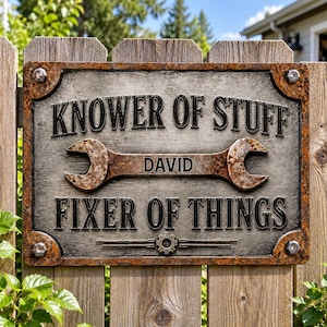May include: A rectangular metal sign with a weathered, rusted border and four corner bolts. The center features a large wrench graphic with the name DAVID printed on it. The text reads KNOWER OF STUFF above the wrench and FIXER OF THINGS below.