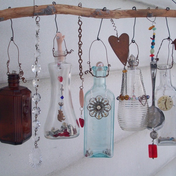 Example of Made when ordered Bottle Chime/Vintage Bottles Embellished with Found Objects, buttons beads, etc. OOAK